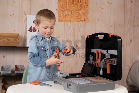 Pracovná dielňa v kufríku 2v1 Bricolo Smart Workbench Black&Decker Smoby rozkladací pracovný stôl s náradím 30 doplnkov