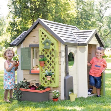 Domček pre záhradníka s kvetináčmi Garden House Life Smoby rozšíriteľný s odkvapom a mriežka s kŕmidlom pre vtáčiky 135 cm s UV filtrom od 24 mes - mo