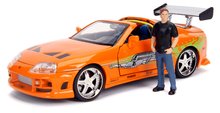 Kisautó Toyota Supra 1995 Fast & Furious Jada fém nyitható részekkel és Brian O´Connor figurával hossza  21 cm 1:24